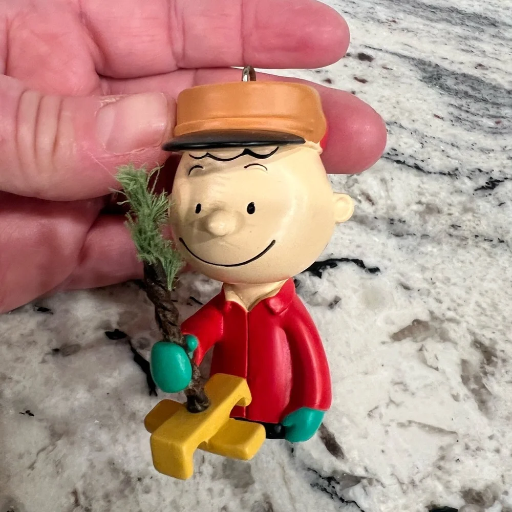 Hallmark Peanuts Charlie Brown Kneeling with Tree ornament